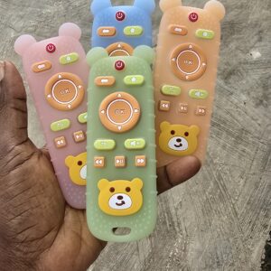 "Baby silicone remote control teether toy in pink, blue, green and orange bear design — safe for teething babies"